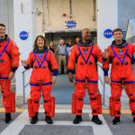 Artemis II crew members (from left) CSA (Canadian Space Agency) astronaut Jeremy Hansen, and NASA astronauts Christina Koch, Victor Glover, and Reid Wiseman walk out of Astronaut Crew Quarters inside the Neil Armstrong Operations and Checkout Building to the Artemis crew transportation vehicles prior to traveling to Launch Pad 39B as part of an integrated ground systems test at Kennedy Space Center in Florida on Sept. 20, 2023, to test the crew timeline for launch day. NASA/Kim Shiflett