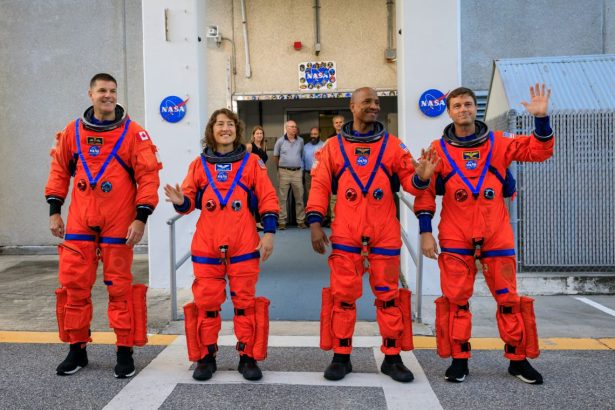 Artemis II crew members (from left) CSA (Canadian Space Agency) astronaut Jeremy Hansen, and NASA astronauts Christina Koch, Victor Glover, and Reid Wiseman walk out of Astronaut Crew Quarters inside the Neil Armstrong Operations and Checkout Building to the Artemis crew transportation vehicles prior to traveling to Launch Pad 39B as part of an integrated ground systems test at Kennedy Space Center in Florida on Sept. 20, 2023, to test the crew timeline for launch day. NASA/Kim Shiflett