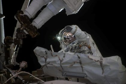 NASA astronaut Jessica Meir waves at the camera during a seven-hour, two-minute spacewalk outside the International Space Station on March 18, 2026. Credit: NASA